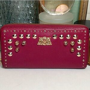 Juicy Couture Pink/Red Studded wallet
8" wide x 4" tall